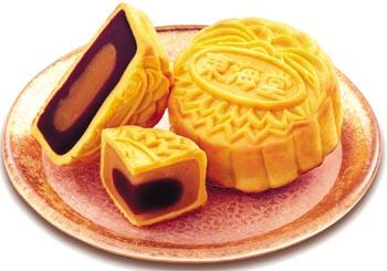 Yellow Mooncakes on Pink Plate